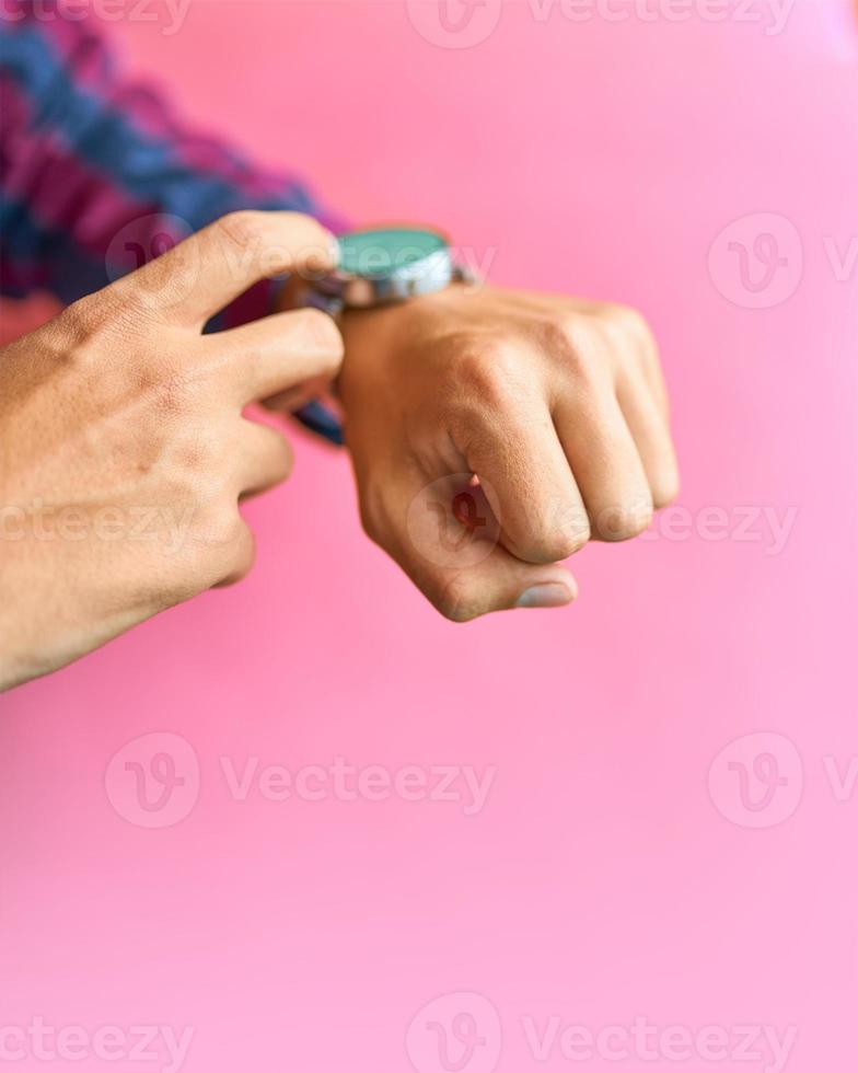 Man wears a smartwatch in everyday lifestyle photo