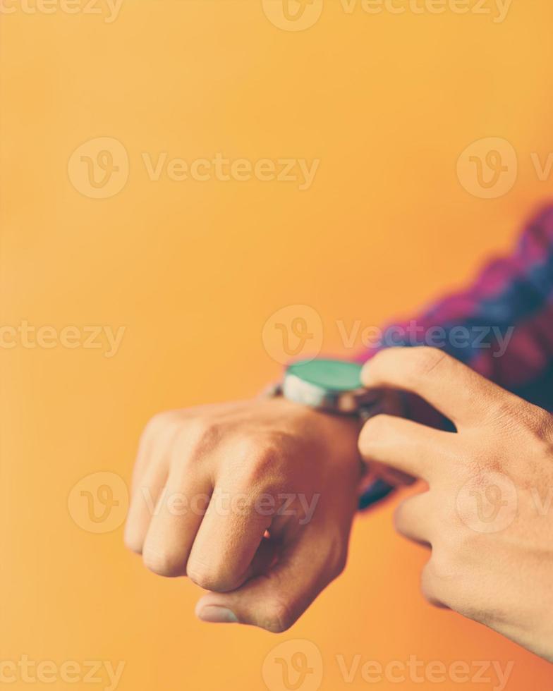 Man wears a smart watch in everyday lifestyle photo