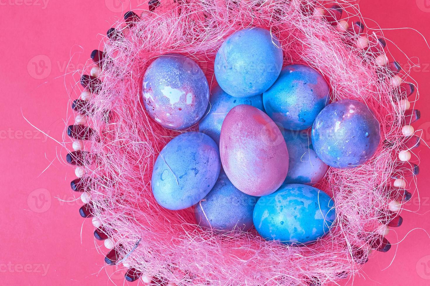 Easter eggs in nest photo