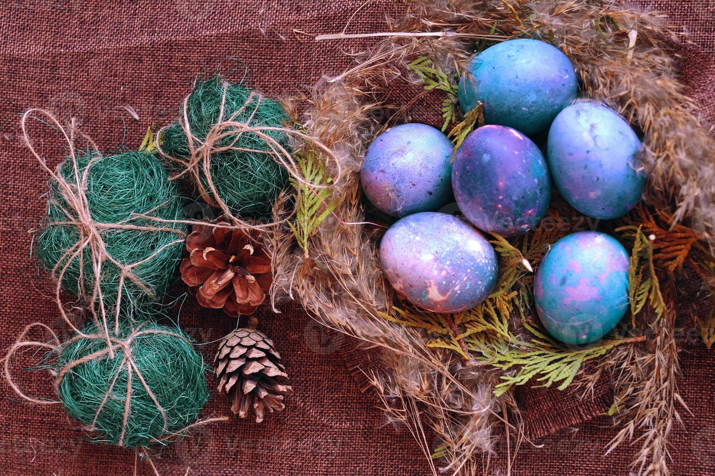 Easter eggs in the nest photo