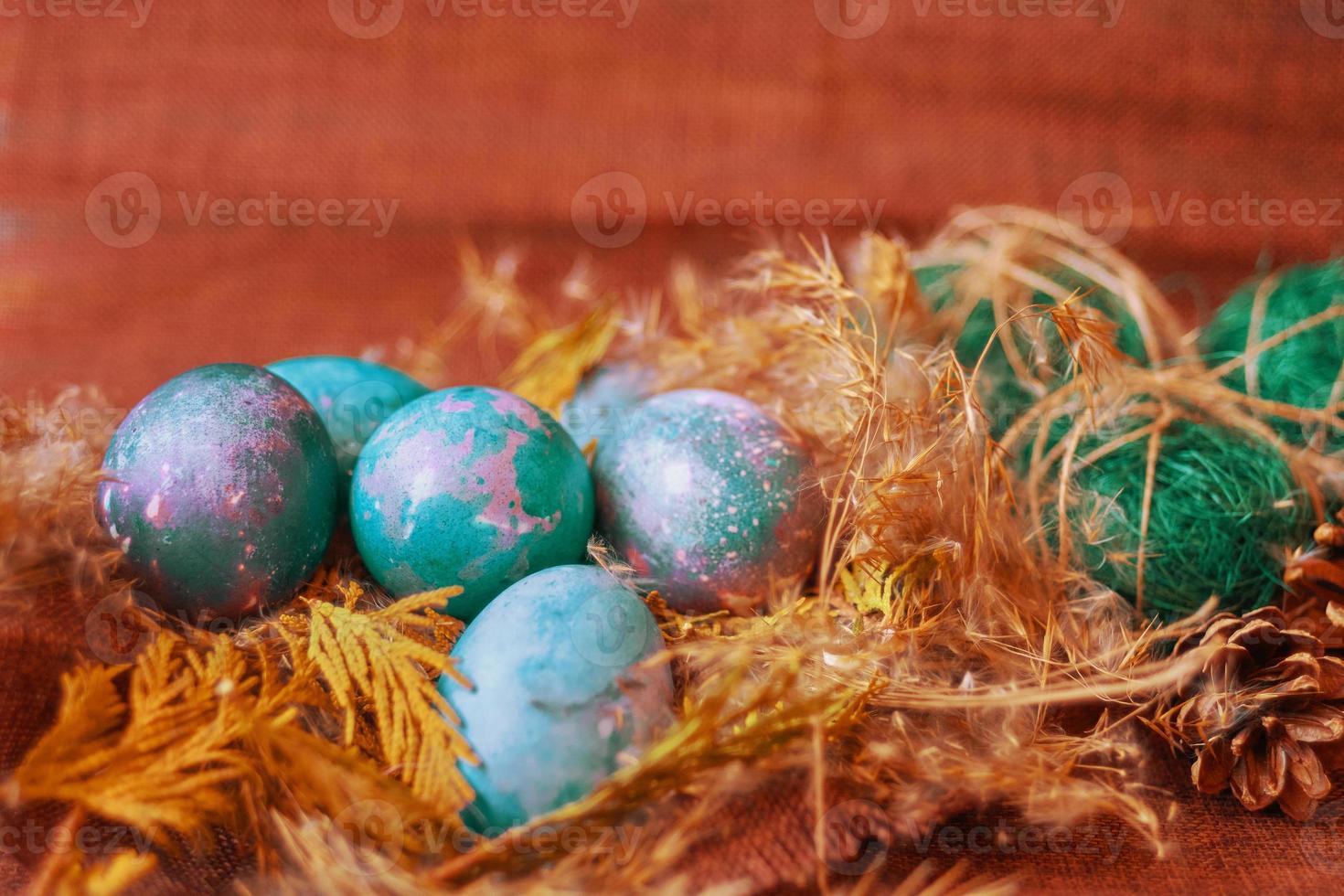 Easter eggs in the nest photo