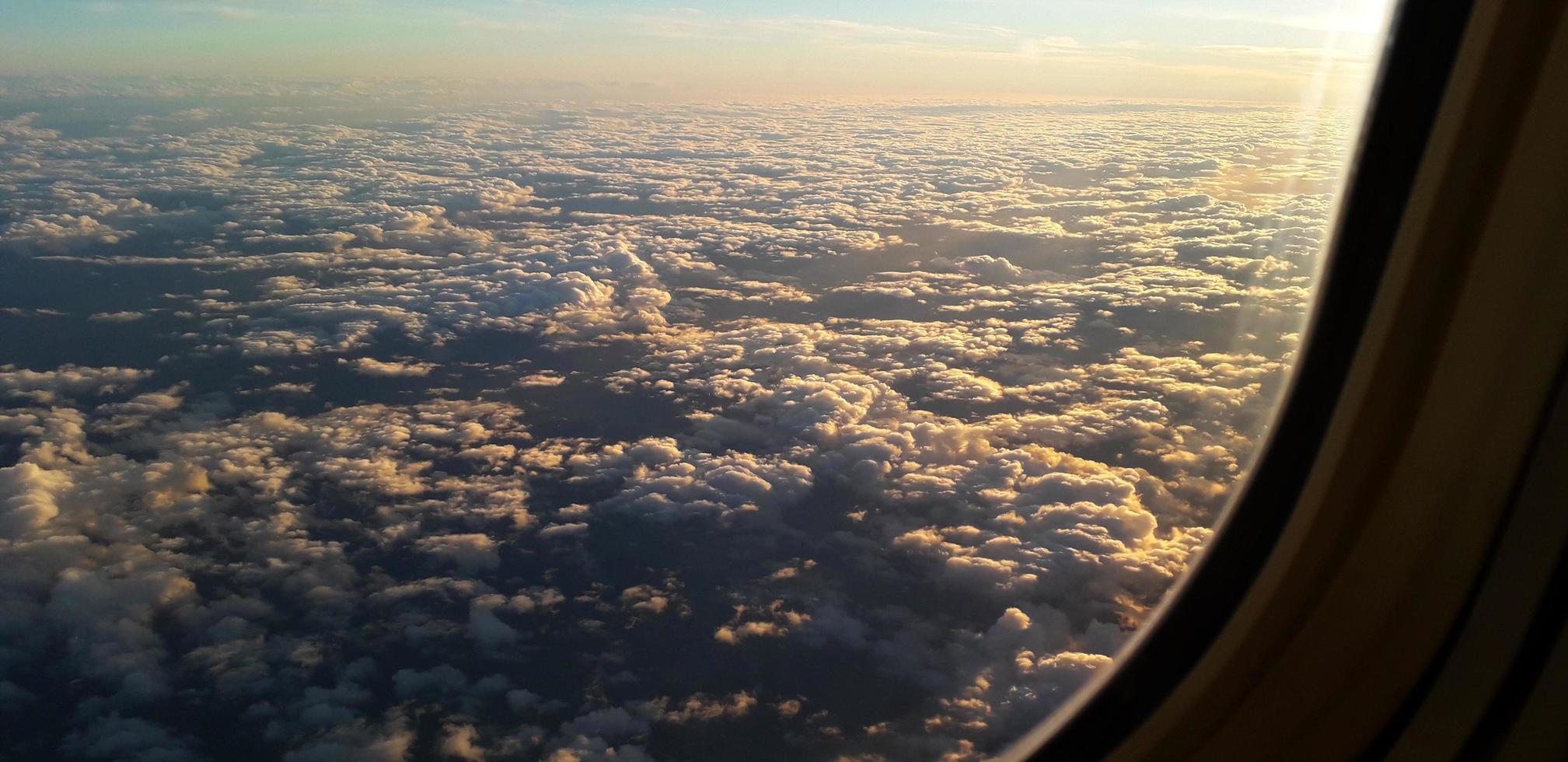 Cloudy skies from the view of a plane photo