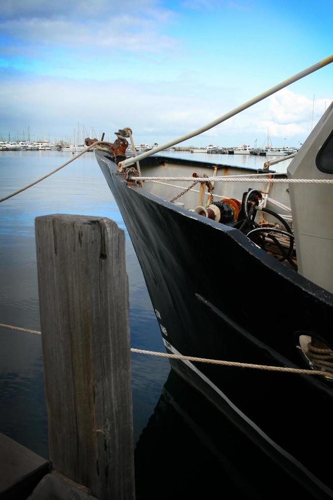 Fishing trawler in a harbor photo