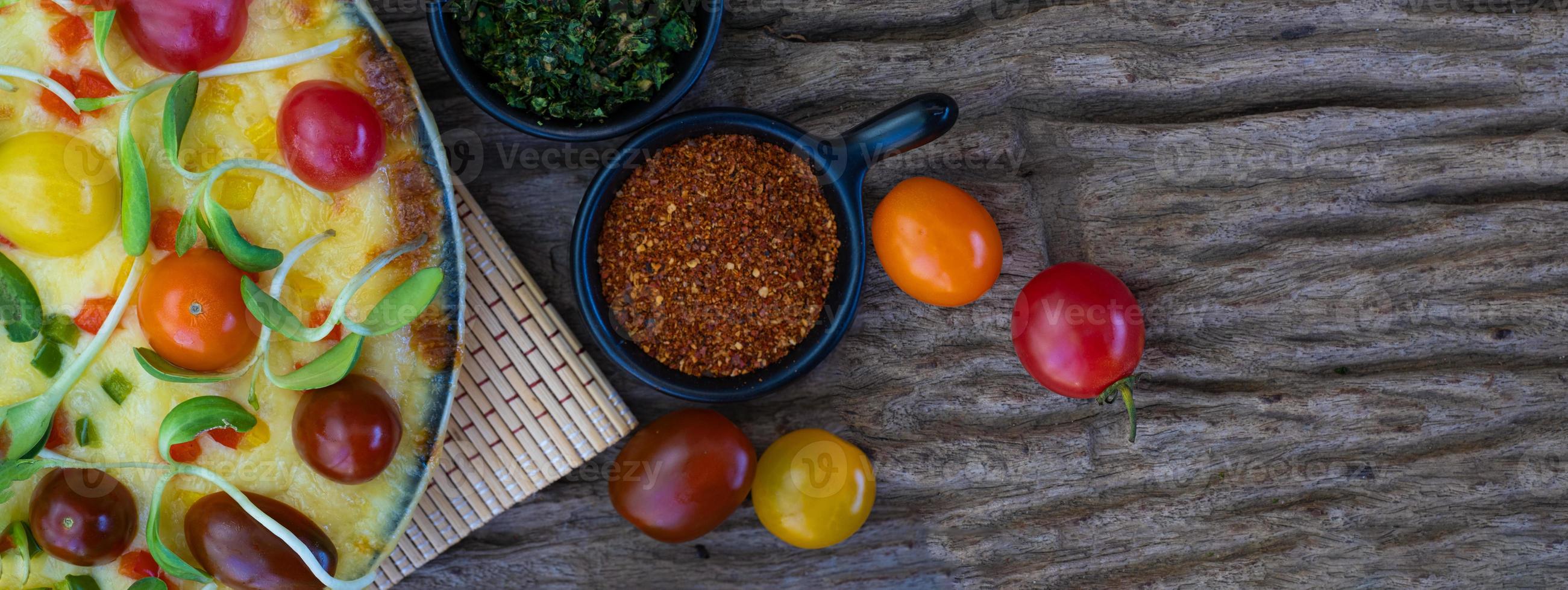 Homemade veggie pizza with cherry tomatoes banner format photo