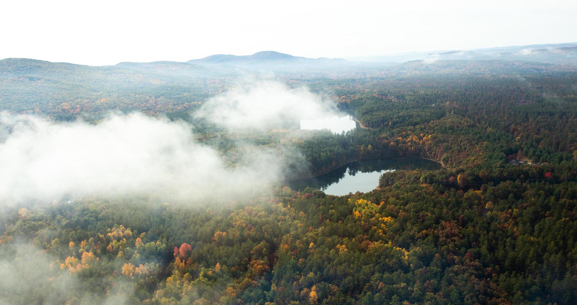 Aerial view of misty New England hills in autumn photo