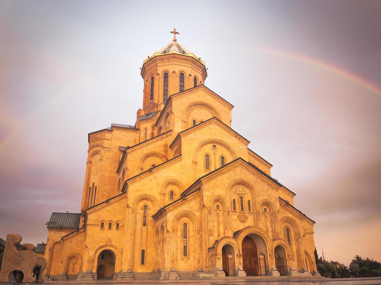 Tbilisi, Georgia 2020- Panoramic view Tbilisi holy trinity cathedral with rainbow background photo