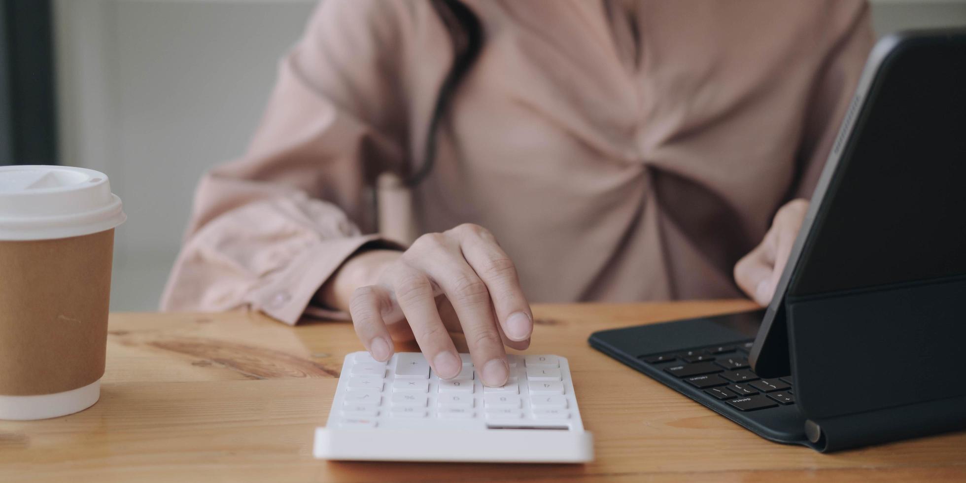 Business woman working in finance and accounting photo