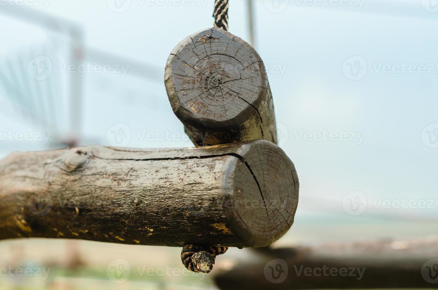 Wooden logs and ropes photo