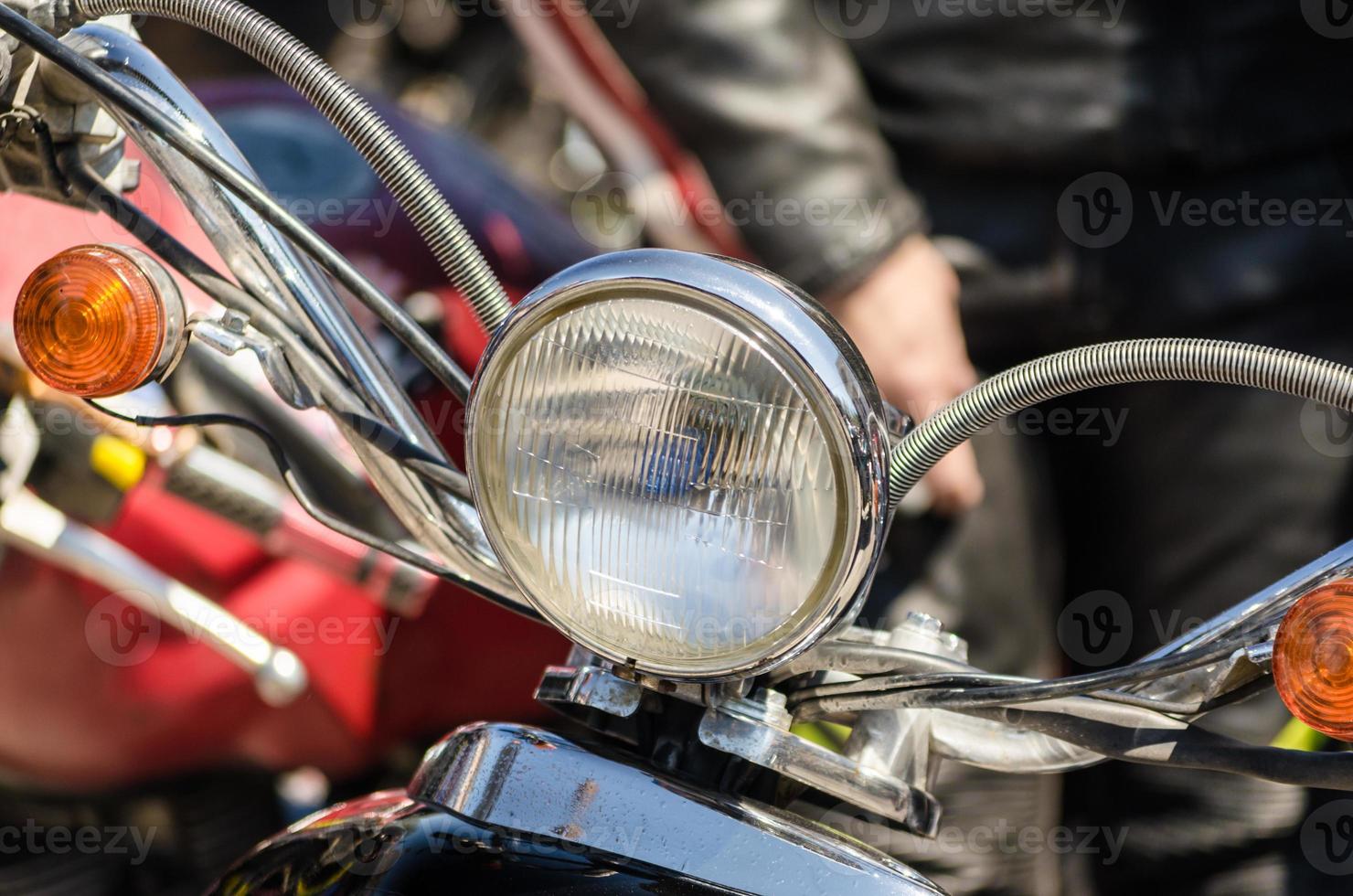 primer plano del faro de la motocicleta foto