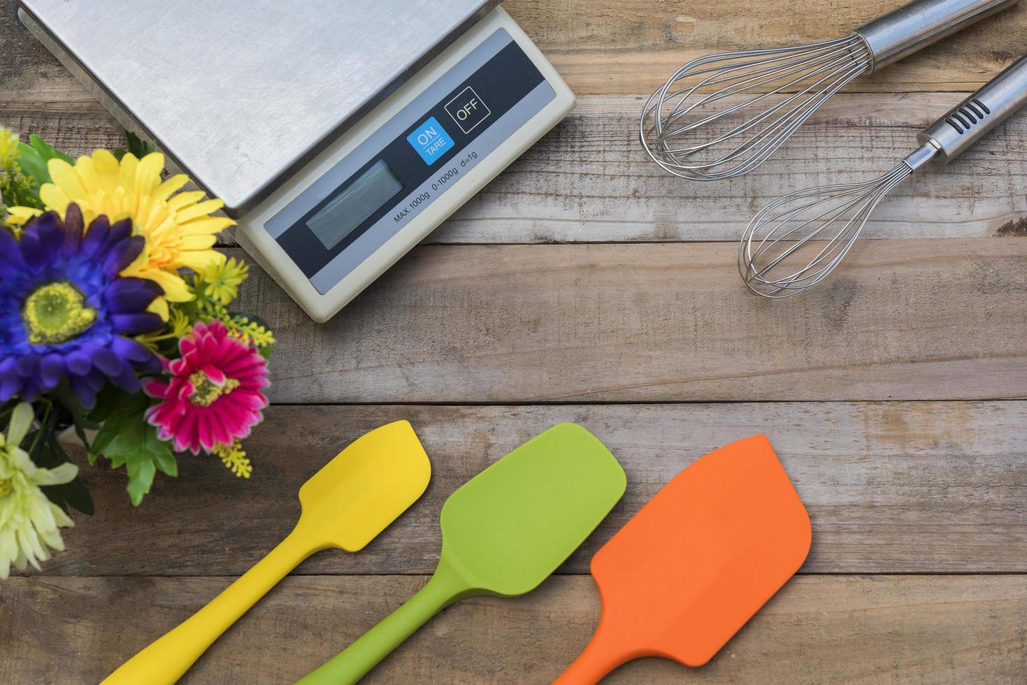 Cooking bakery utensils tools on a wood surface photo