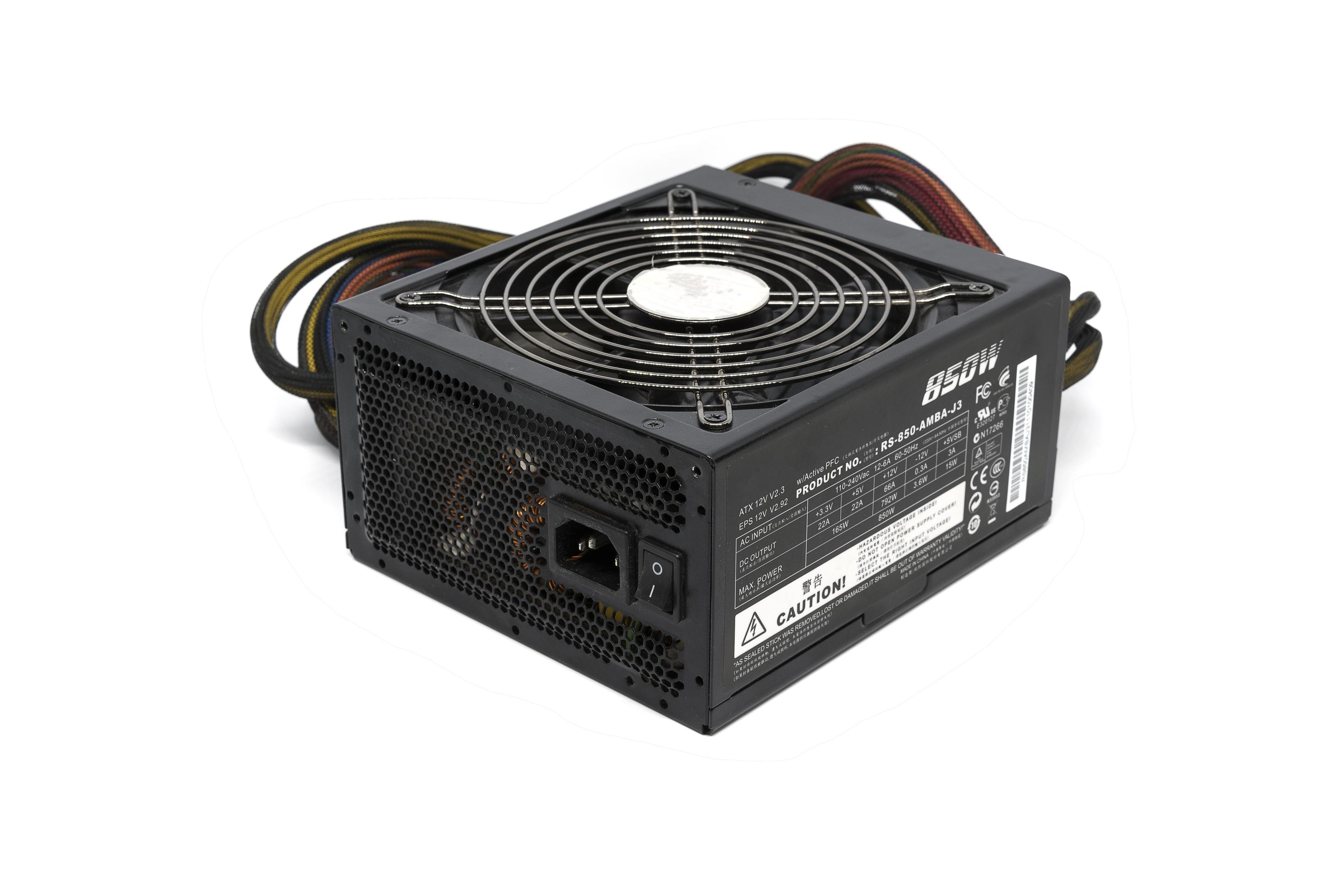 Black 850W Power supply unit with cables and switch I O for ATX tower PC cases isolated on a
