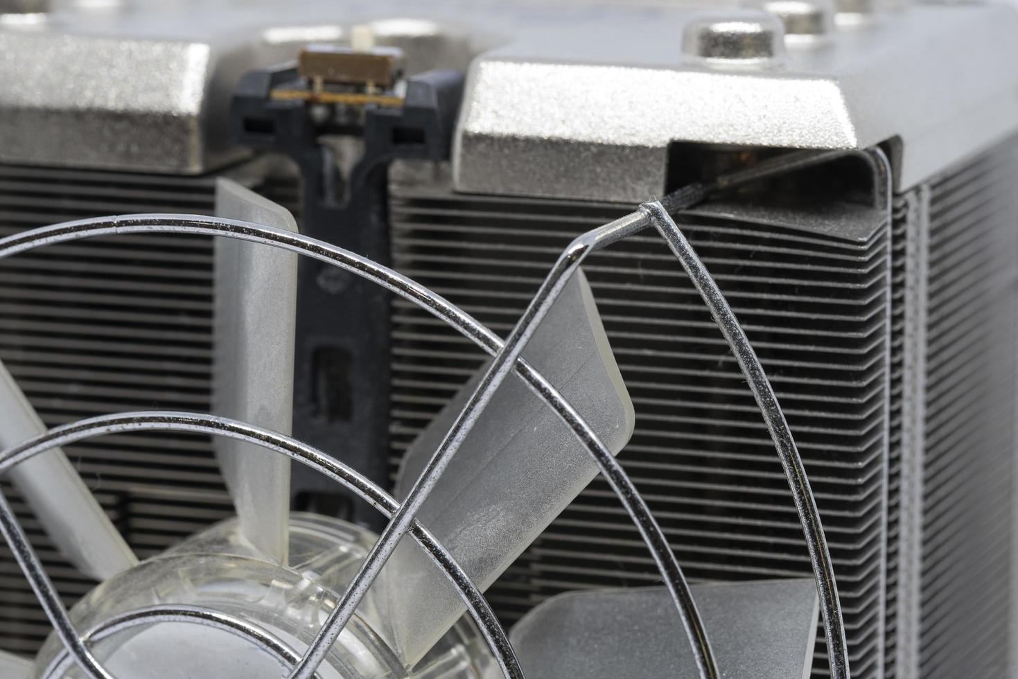 Close up of CPU cooling fan with aluminum finned heat sink photo