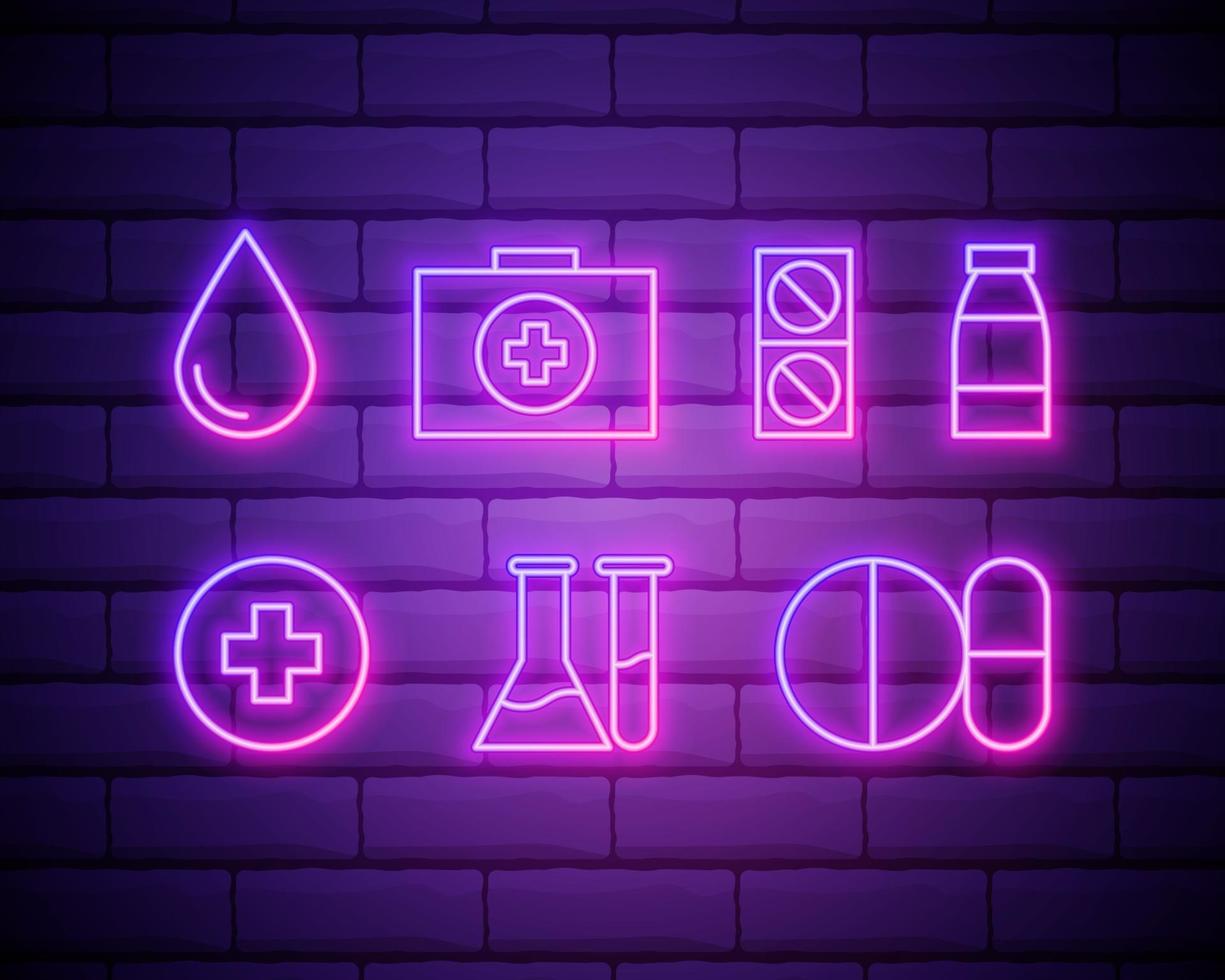 Tema médico coloridos iconos de neón en un fondo de pared de ladrillo vector