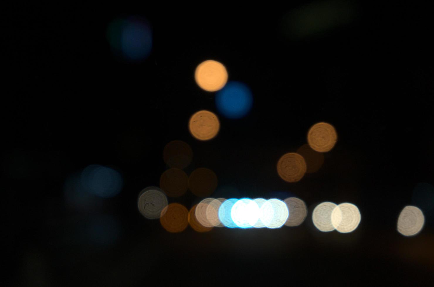 Blurry lights of modern city at the intersection photo