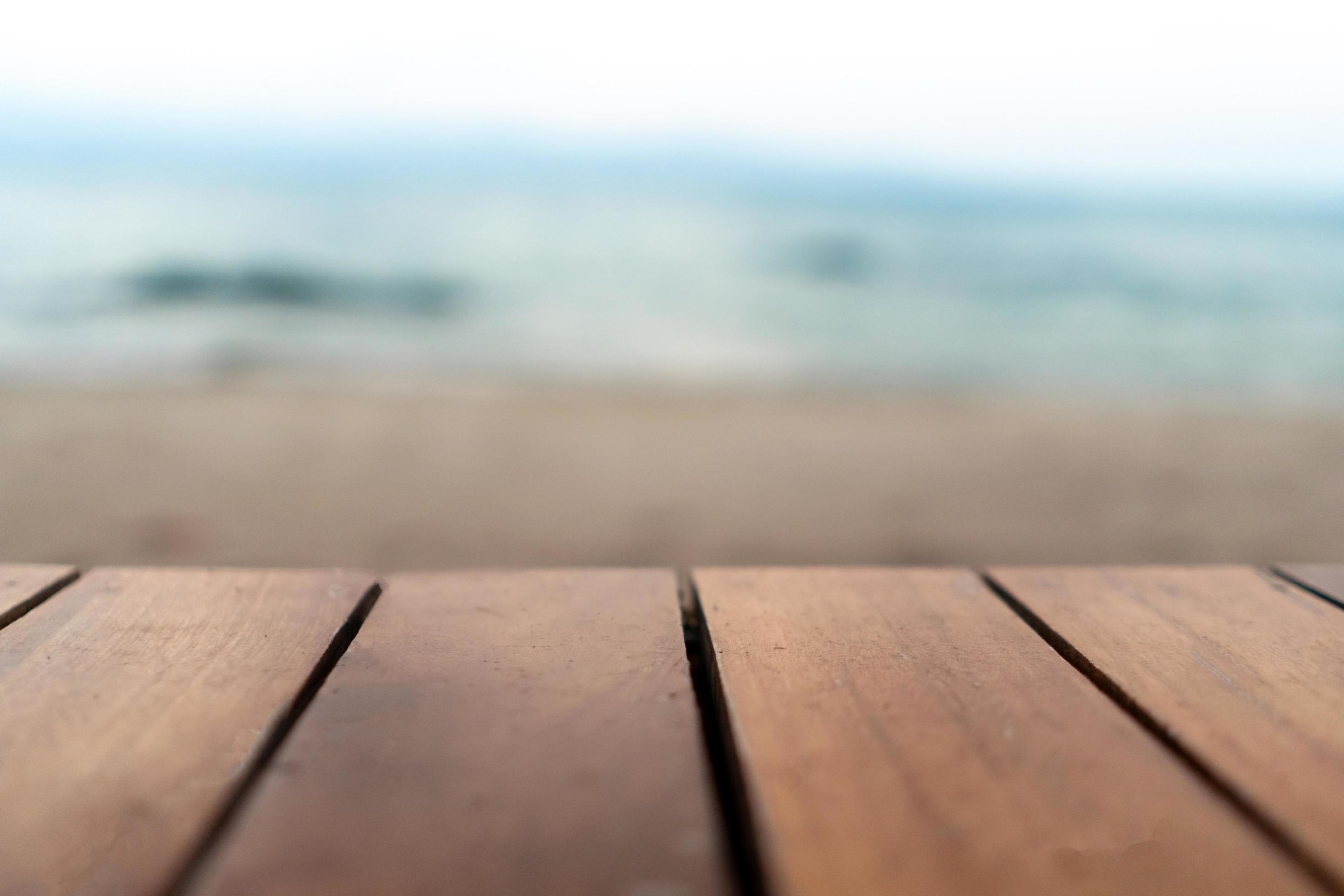 Selective Focus Of Old Wood Table With Blur Beautiful Beach Background For Display 2223859 Stock Photo At Vecteezy