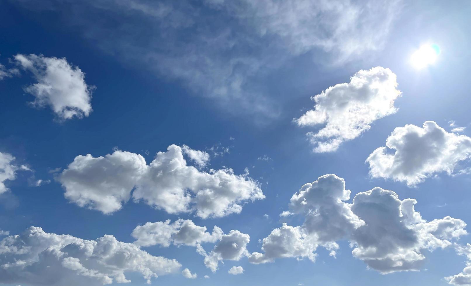 Bright sunny day with blue sky with white clouds photo