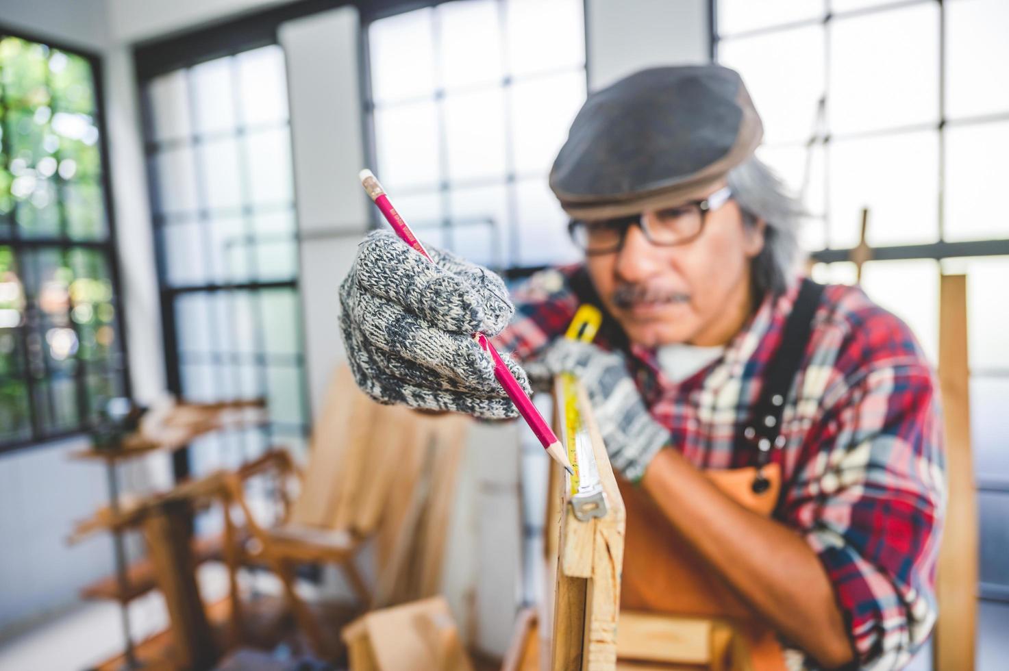 Carpenter holding a pencil photo