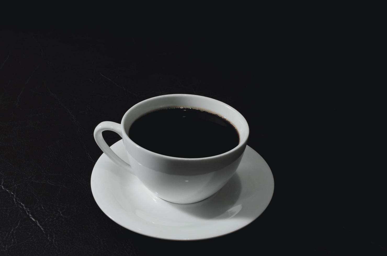 Close up of black coffee in a cup photo