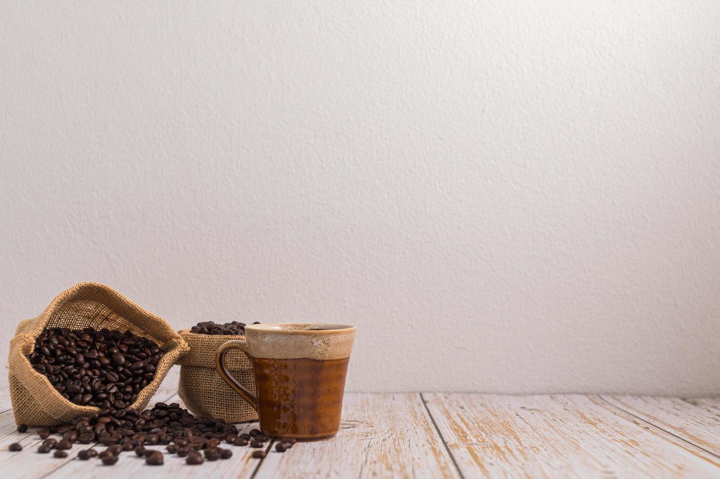 Love drinking coffee, coffee mugs and coffee beans photo