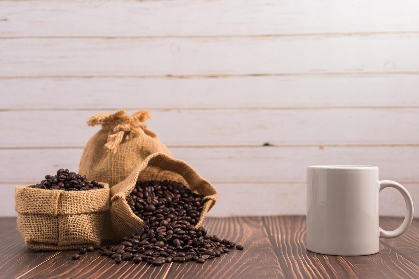 Love drinking coffee, coffee mugs and coffee beans photo