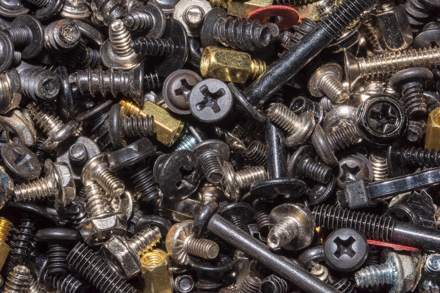 Close up of a pile of metal screws photo