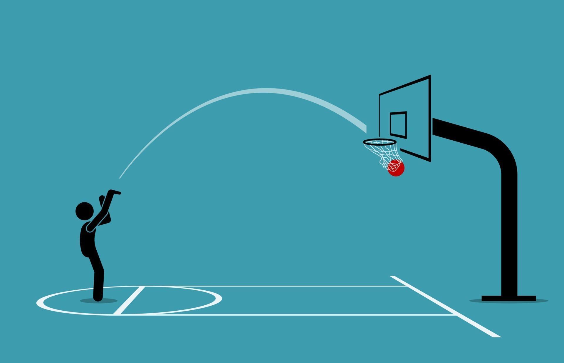 Man shooting a basketball into a hoop and scoring from free throw line