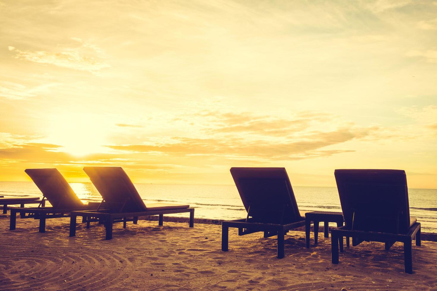 Sunbathing beds on the beach photo