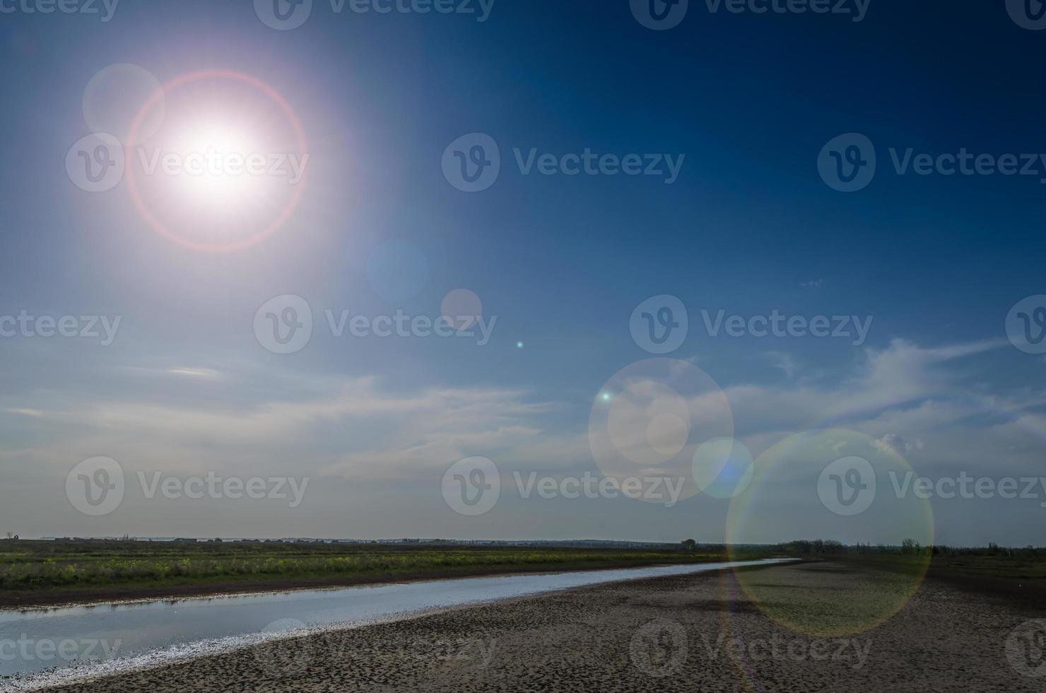 Sun flair and beach photo