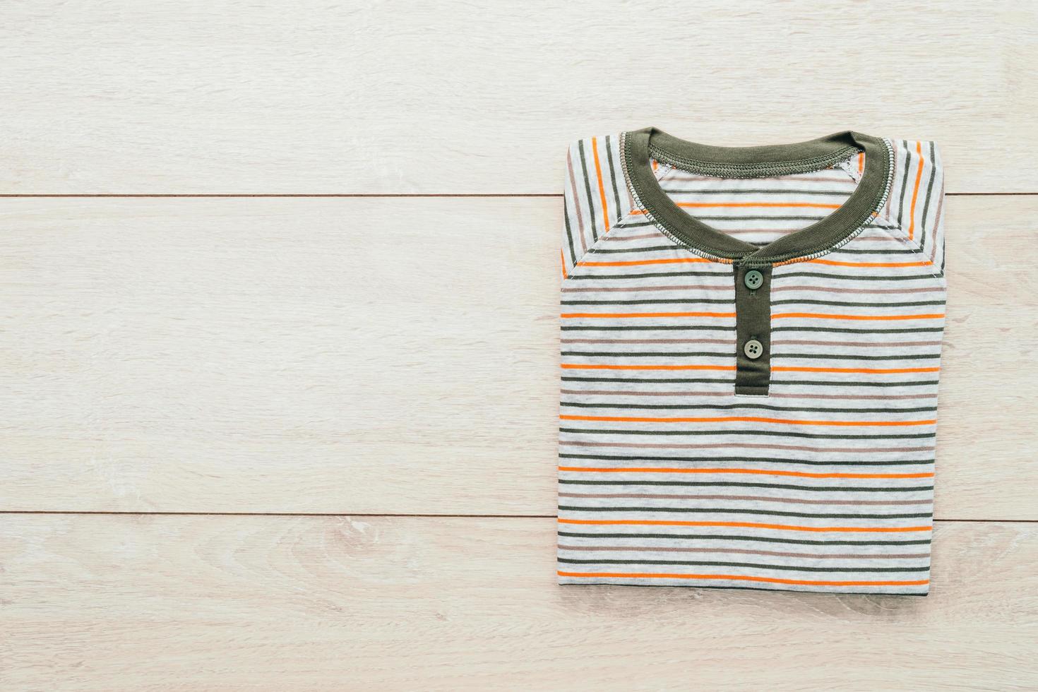 Shirt on wooden background photo