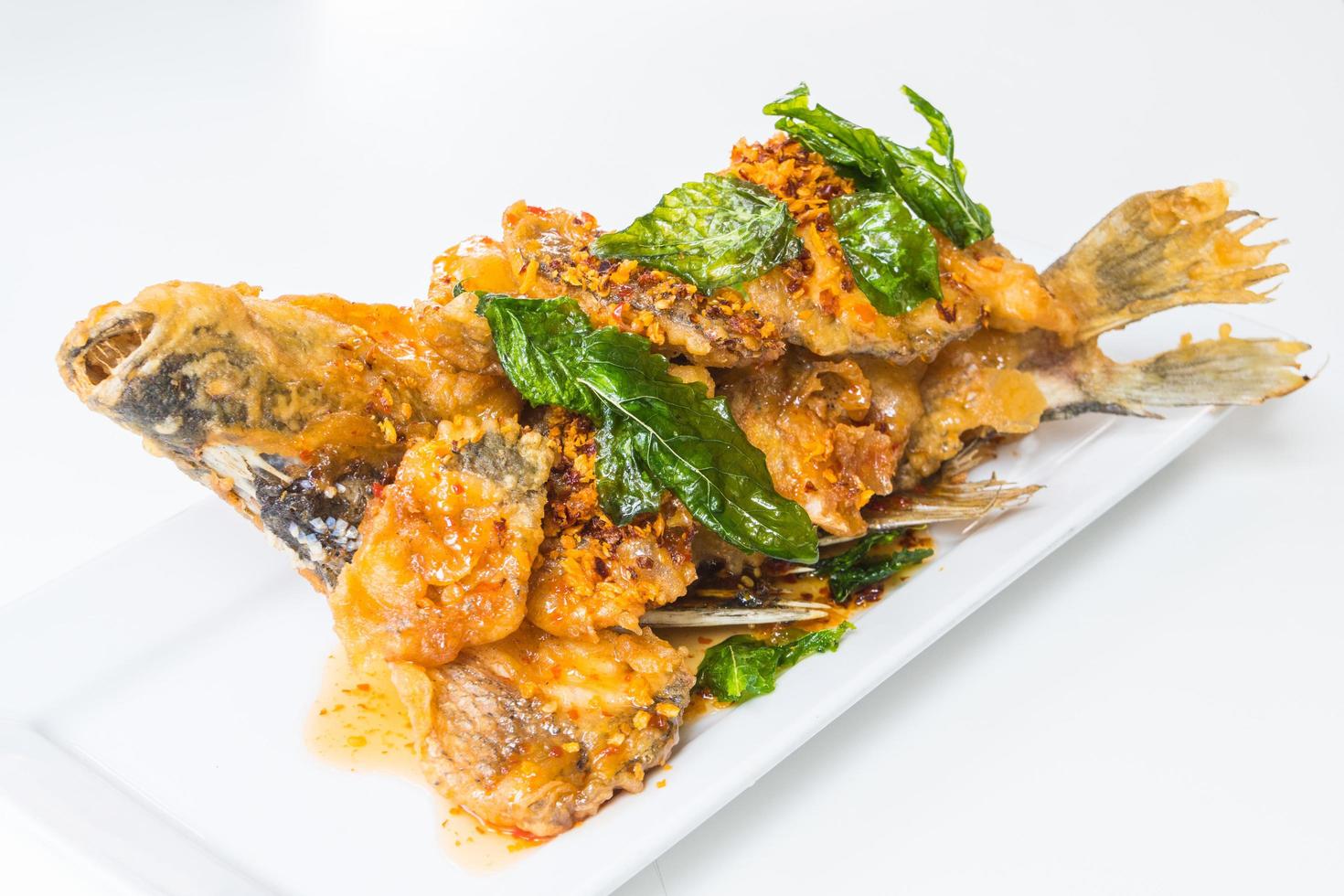 Fried fish with spicy sauce photo