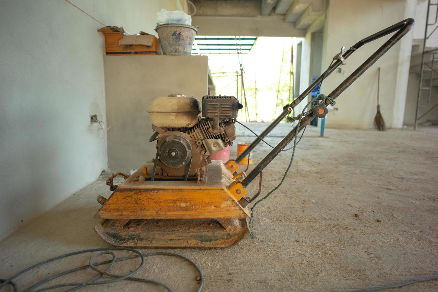 Closeup picture of punching machine in the house under construction photo