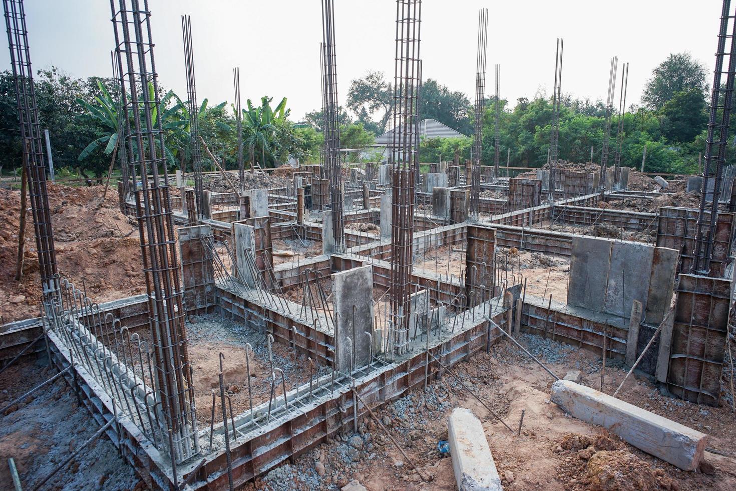 Landscape of house under construction site with reinforcement steelwork photo