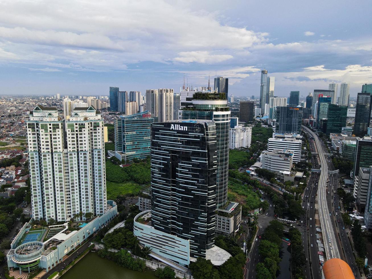 Jakarta, Indonesia 2021- Aerial view of highway intersection and buildings in the city of Jakarta photo