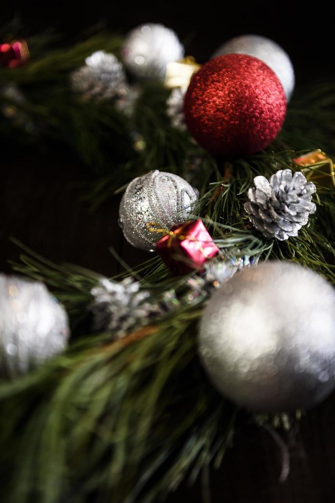 Christmas wreath of fir branches with Christmas decorations photo