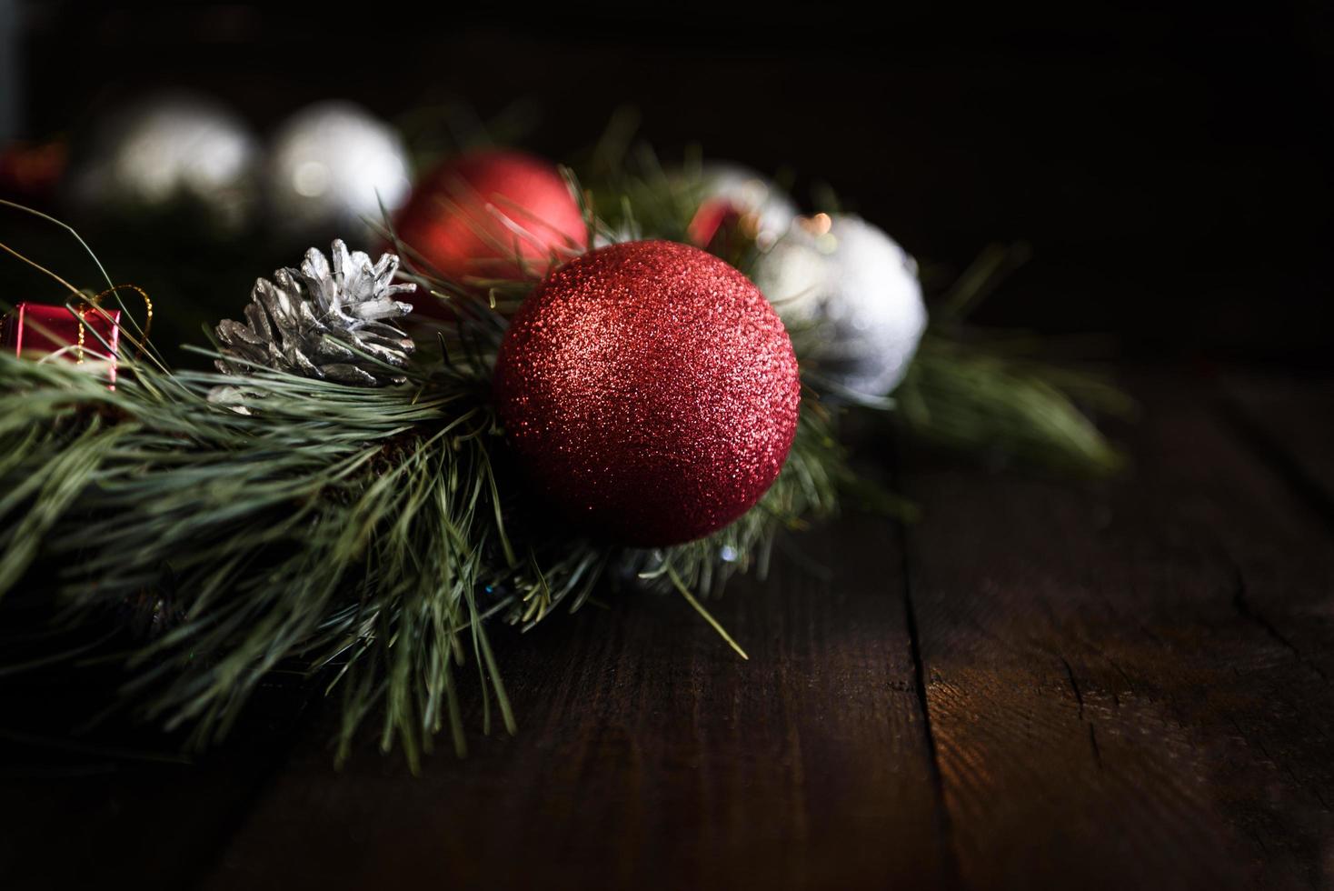 Christmas wreath of fir branches with Christmas decorations photo