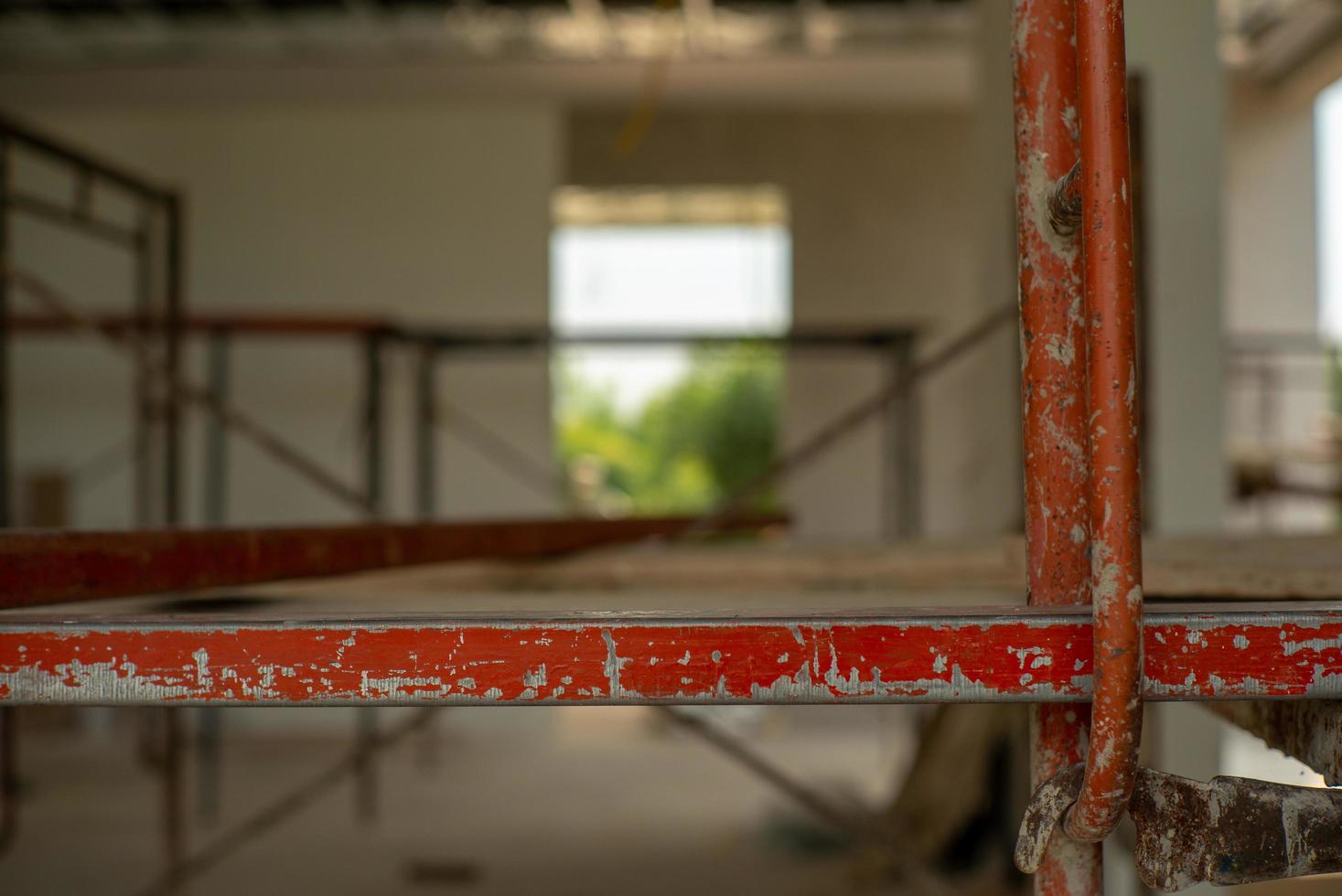 Closeup steel bars on the scaffolding for working at high level at the construction site photo