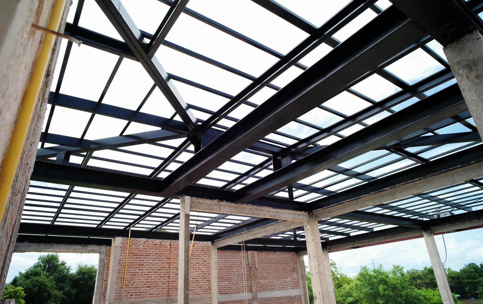 Steel structure for the roof of the house under construction photo