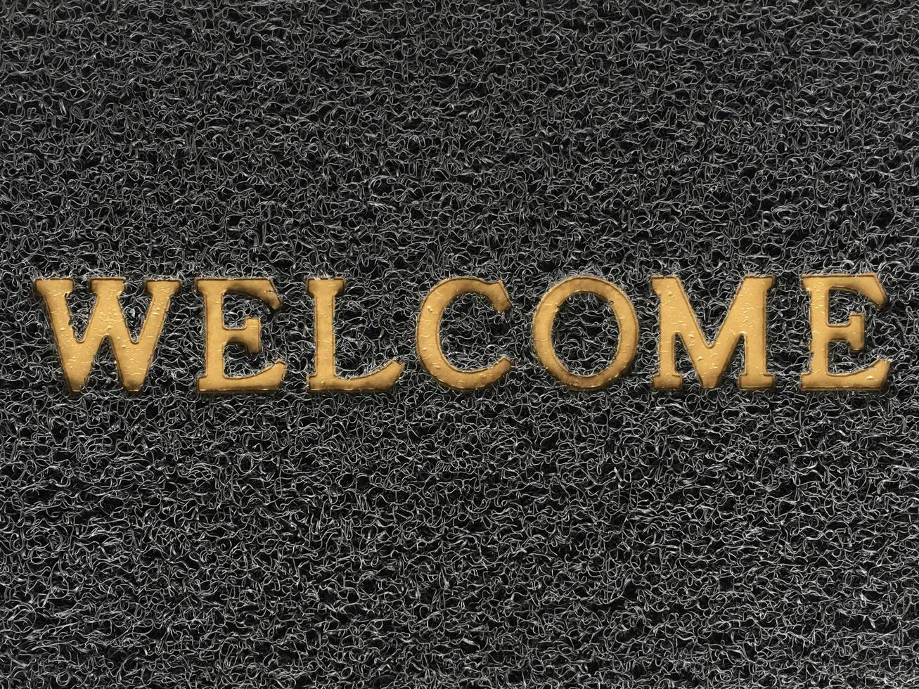 A welcome mat that says welcome photo