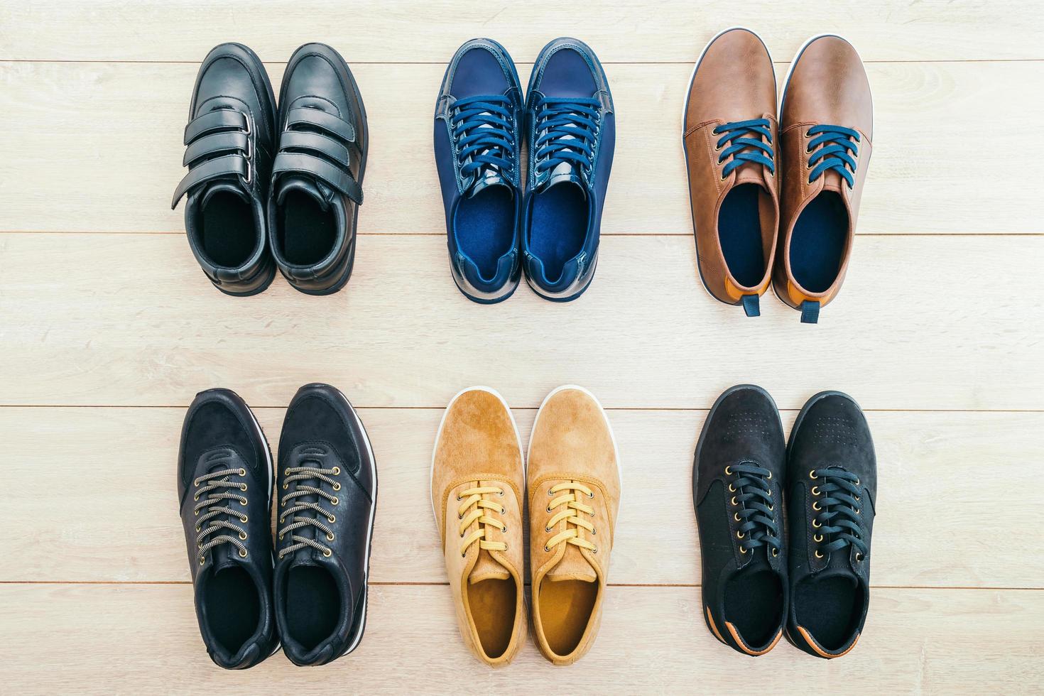 Leather shoes on wooden background photo