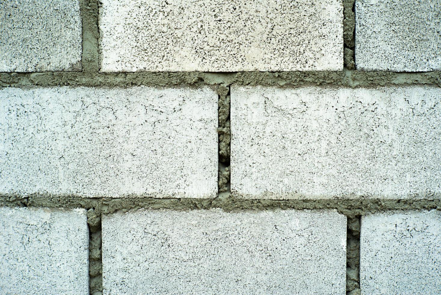 Abstract texture and background of concrete bricklayer wall at the construction site photo