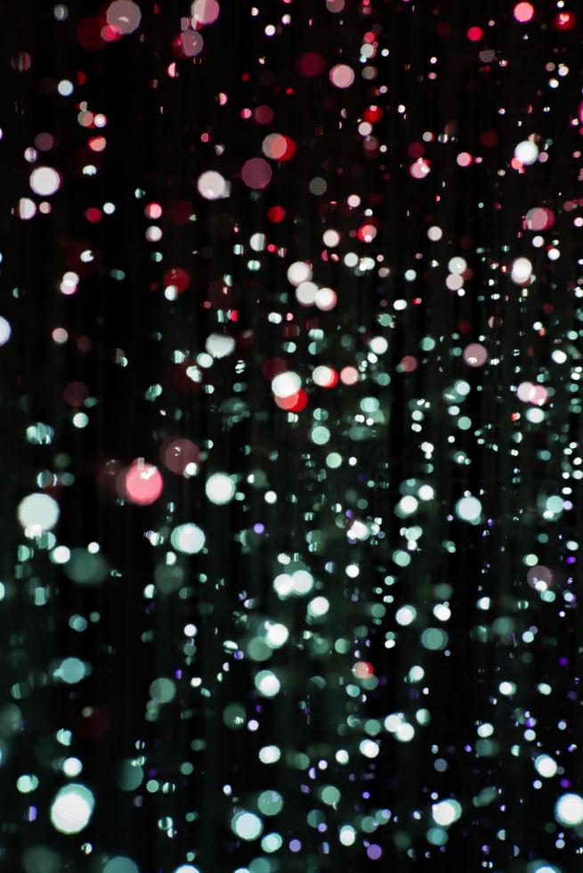 Abstract texture and background of colorful glittering bokeh lights photo