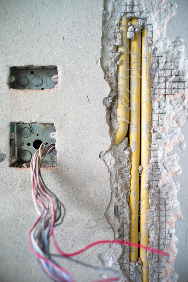 Abstract texture and background of electrical system under insulation inside concrete wall photo