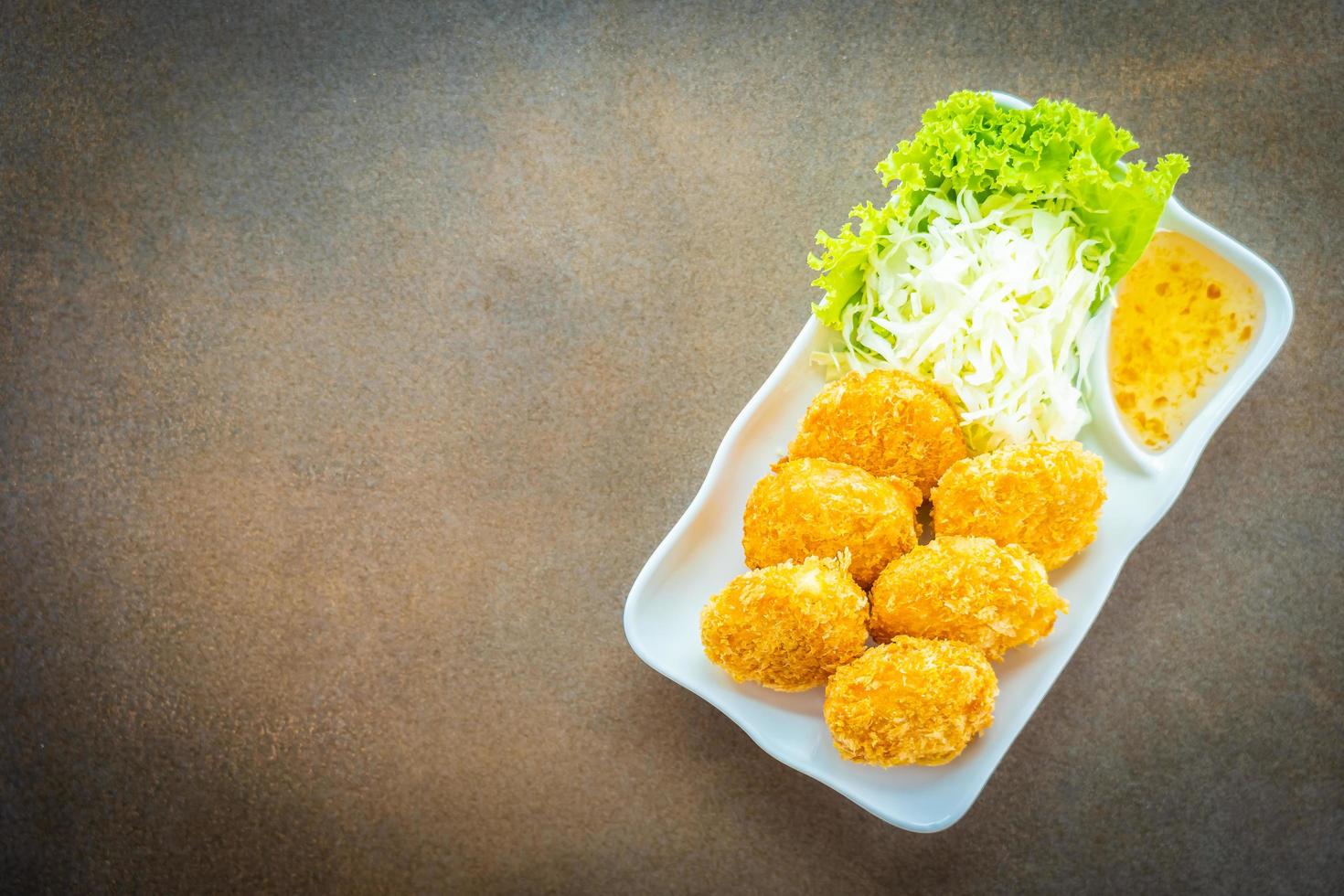 Deep fried shrimp cake or ball with vegetable photo