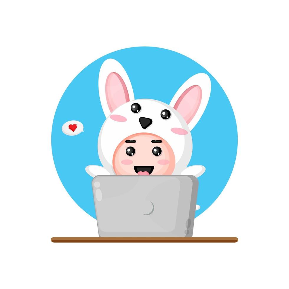 Cute rabbit using a laptop vector