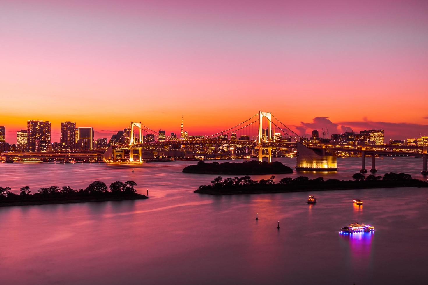 Cityscape of Tokyo city with Rainbow Bridge, Japan photo