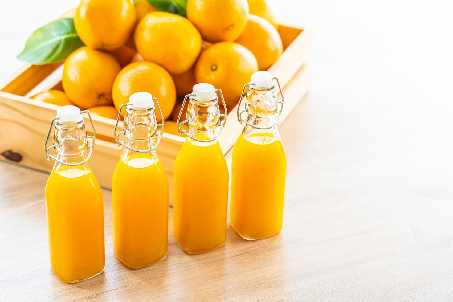 Fresh orange juice for drink in bottle glass photo