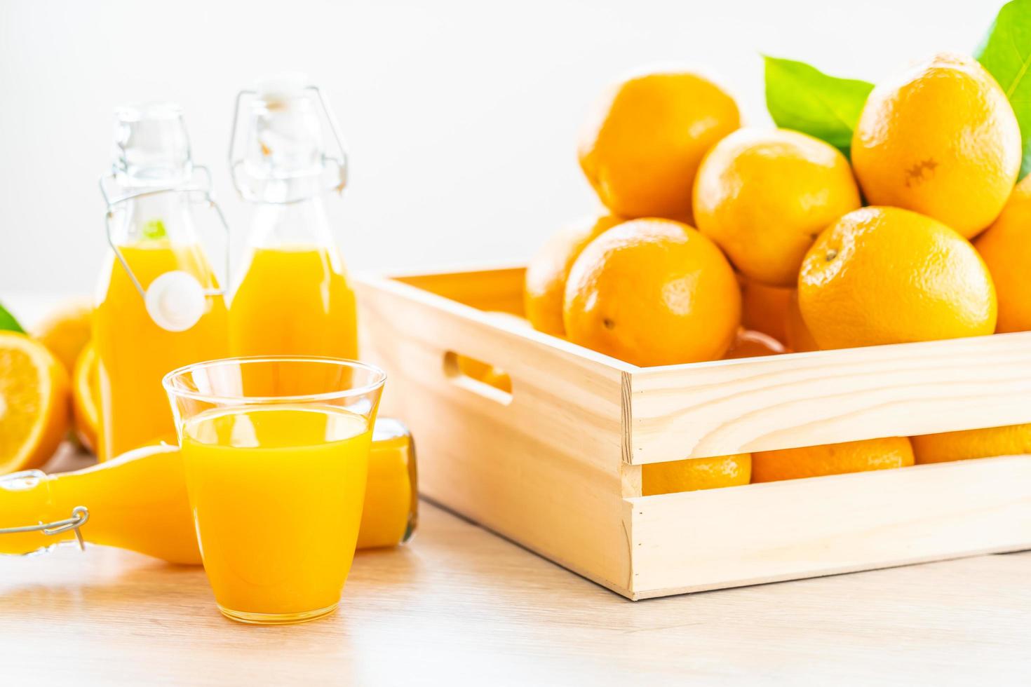 Fresh orange juice for drink in bottle glass photo