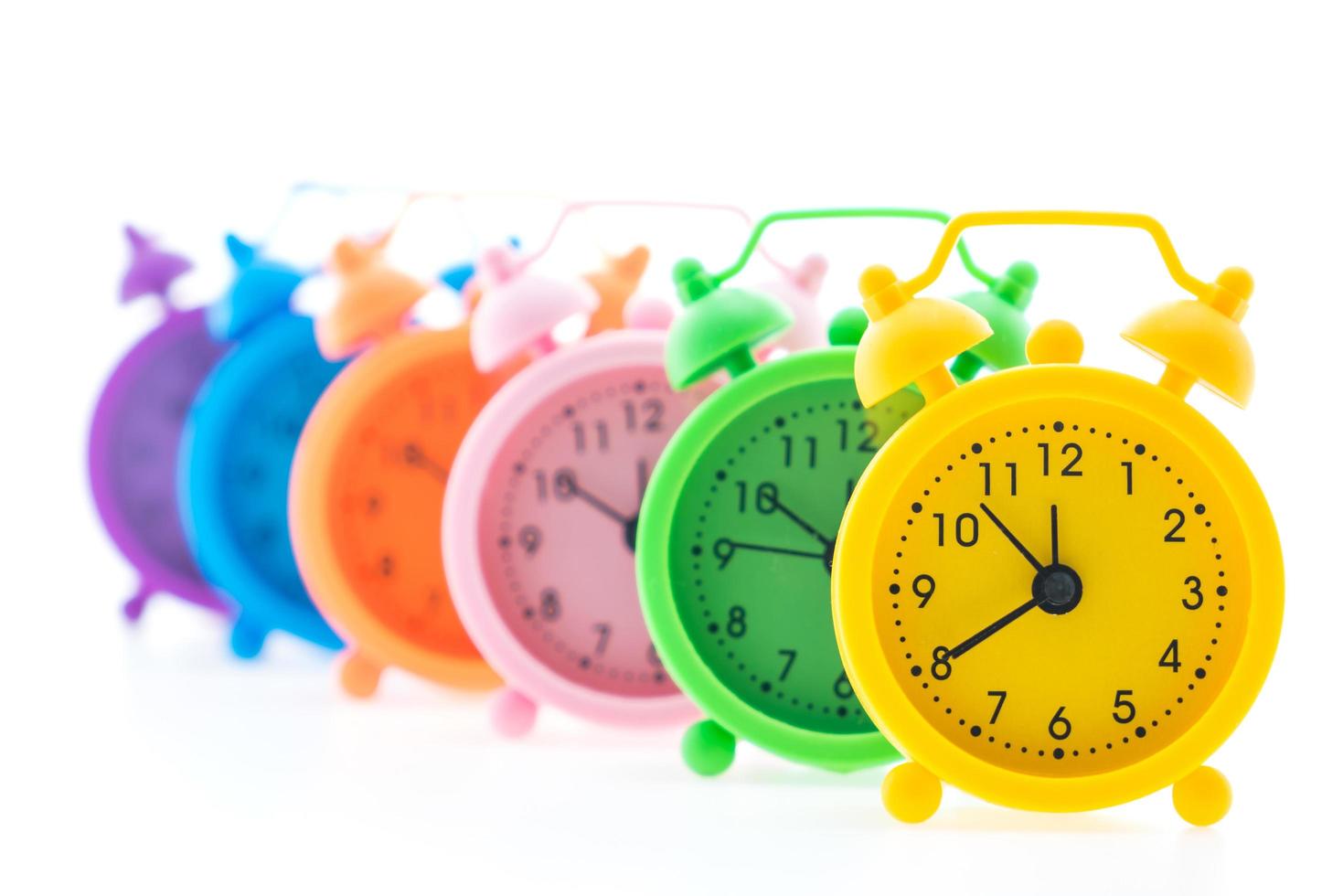 Colourful alarm clocks photo