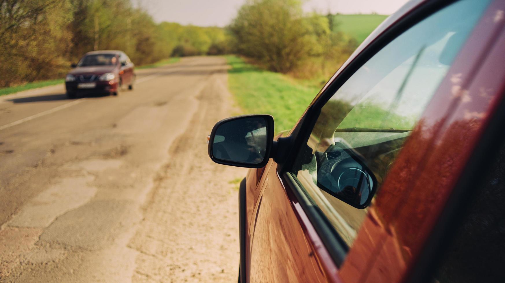 Red cars on the road photo