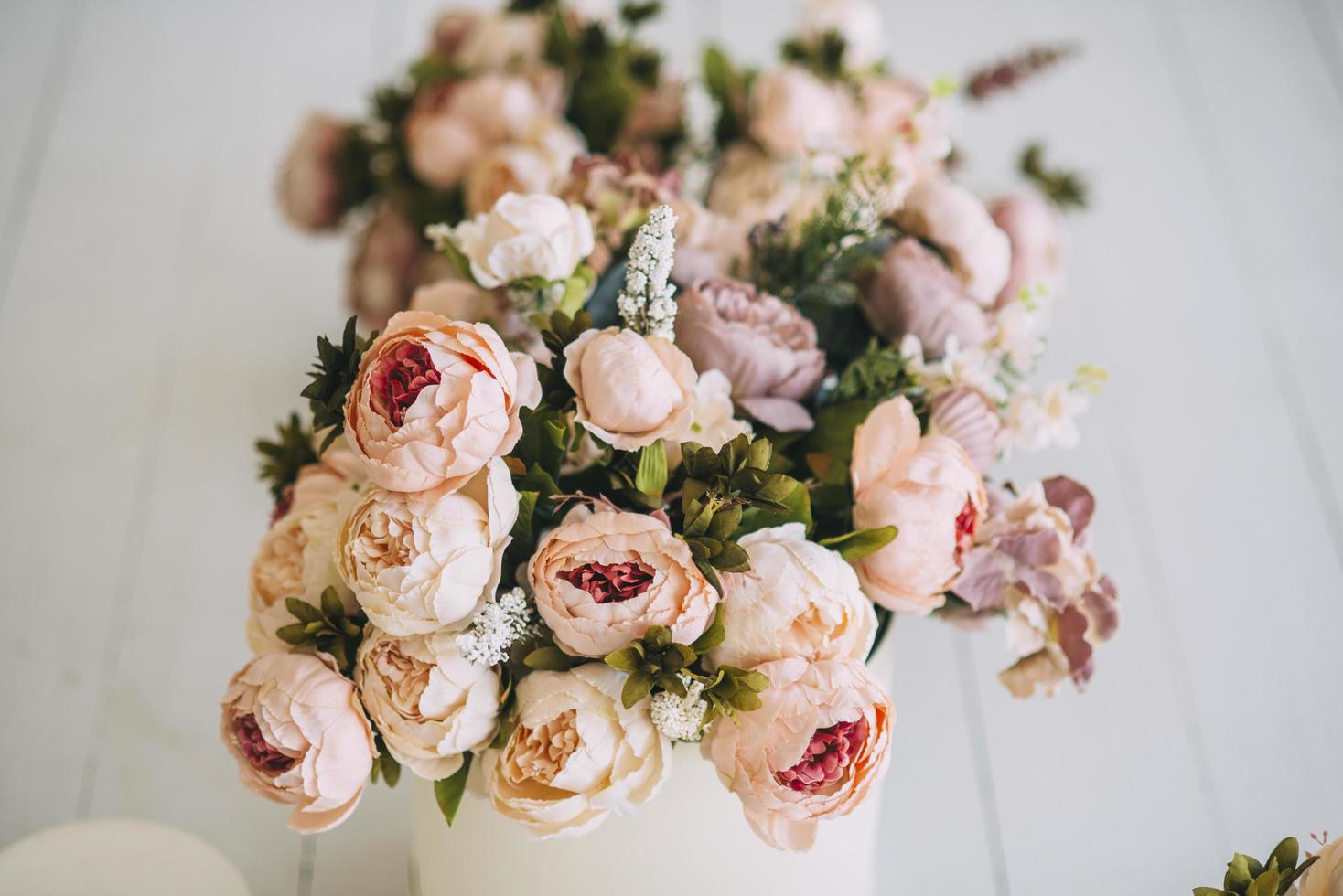 Row of floral centerpieces photo